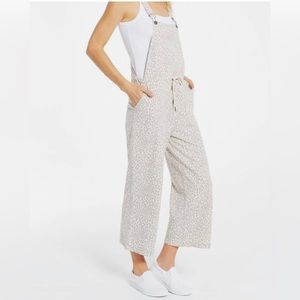Z supply overalls in grey and white animal print.